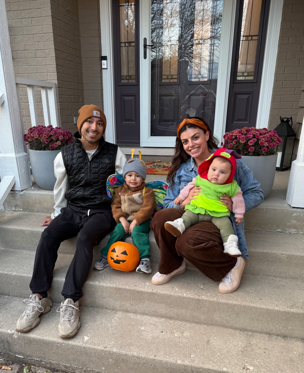 Eric Dumlao and his family dressed for Halloween on their front steps